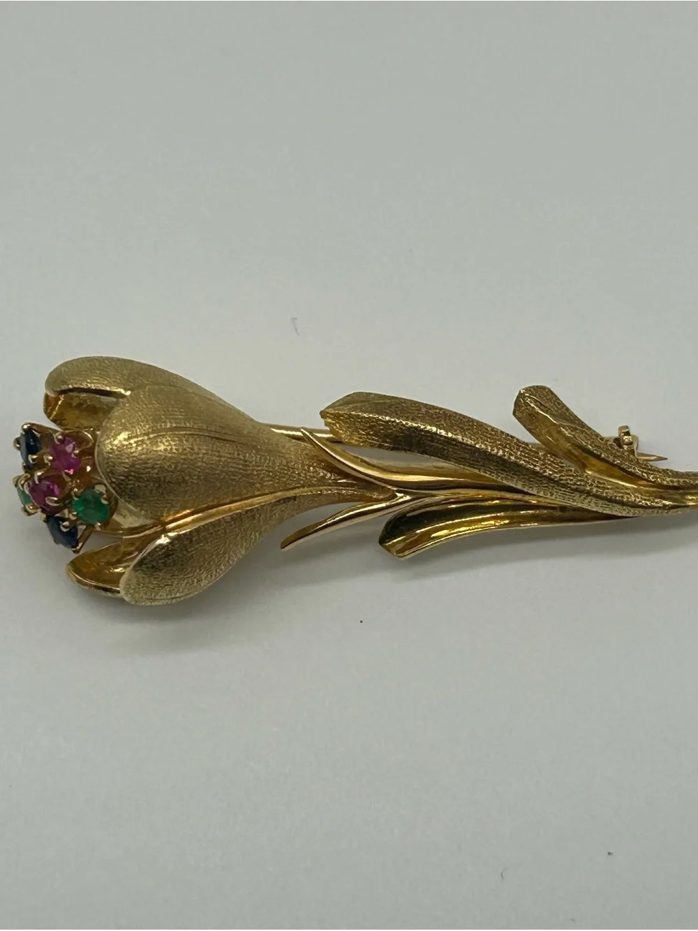 Vintage 1960s 18K Gold Gemstone Flower Brooch — with sapphires, rubies, emeralds
